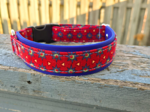 Vintage red geometric pattern dog collar with Biothane backing.